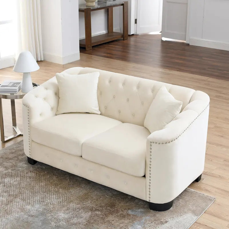 Canapé 2 places chesterfield en velours gris avec cloutage