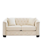 Canapé 2 places chesterfield en velours gris avec cloutage