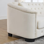 Canapé 2 places chesterfield en velours gris avec cloutage