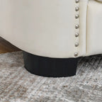 Canapé 2 places chesterfield en velours gris avec cloutage