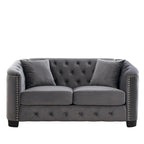 Canapé 2 places chesterfield en velours gris avec cloutage