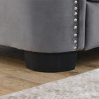 Canapé 2 places chesterfield en velours gris avec cloutage