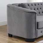 Canapé 2 places chesterfield en velours gris avec cloutage